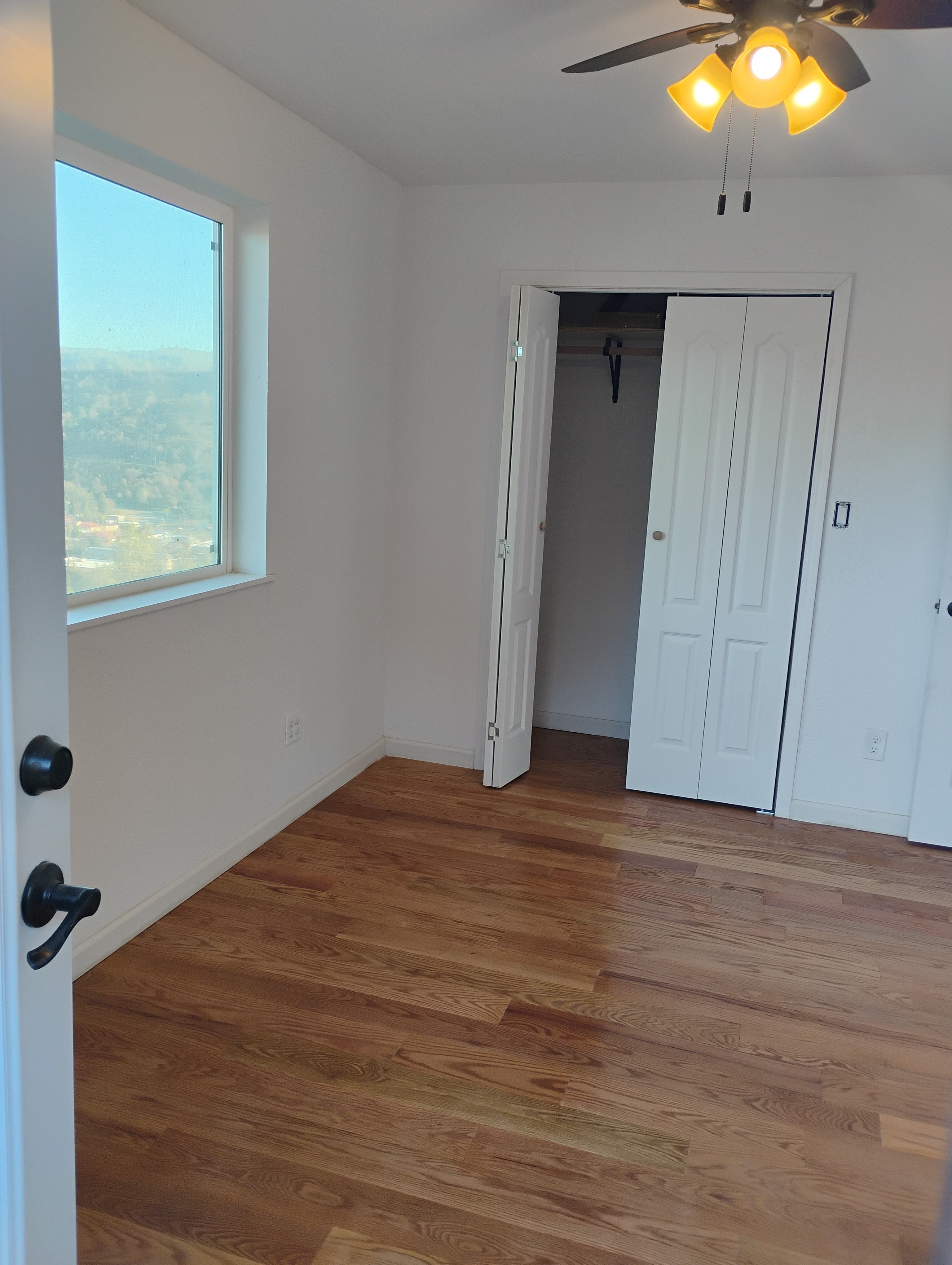 Bedroom remodel in Mariposa CA with hardwood flooring finish by DCB Design Create Build