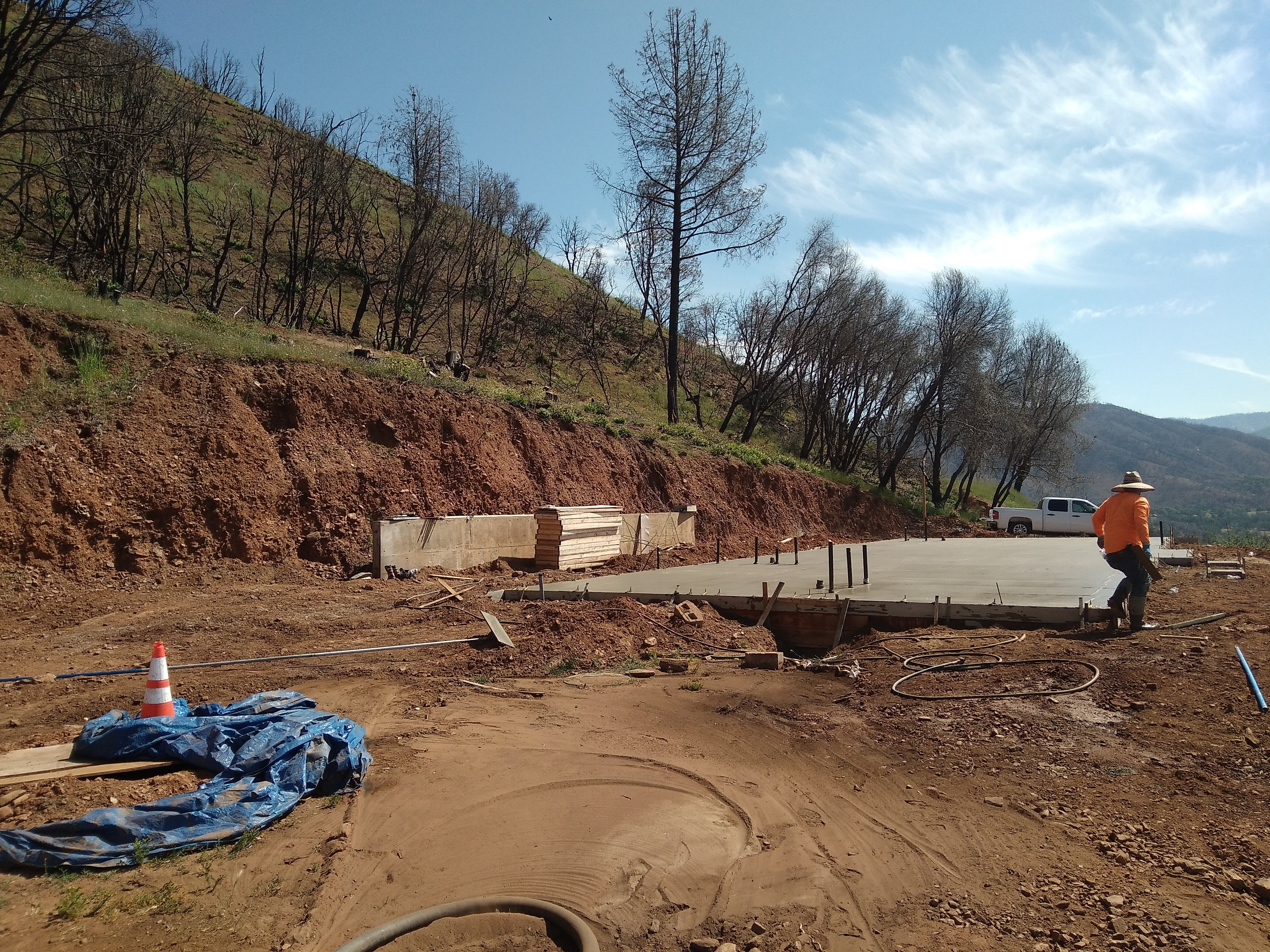 Concrete slab pour on hillside property in Mariposa CA