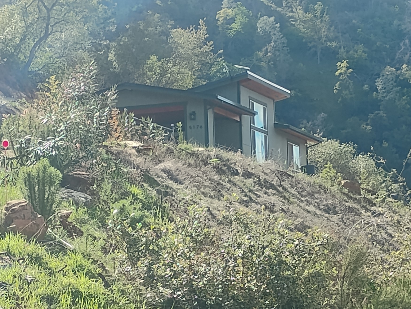Custom home built on hillside in Mariposa CA by DCB Design Create Build