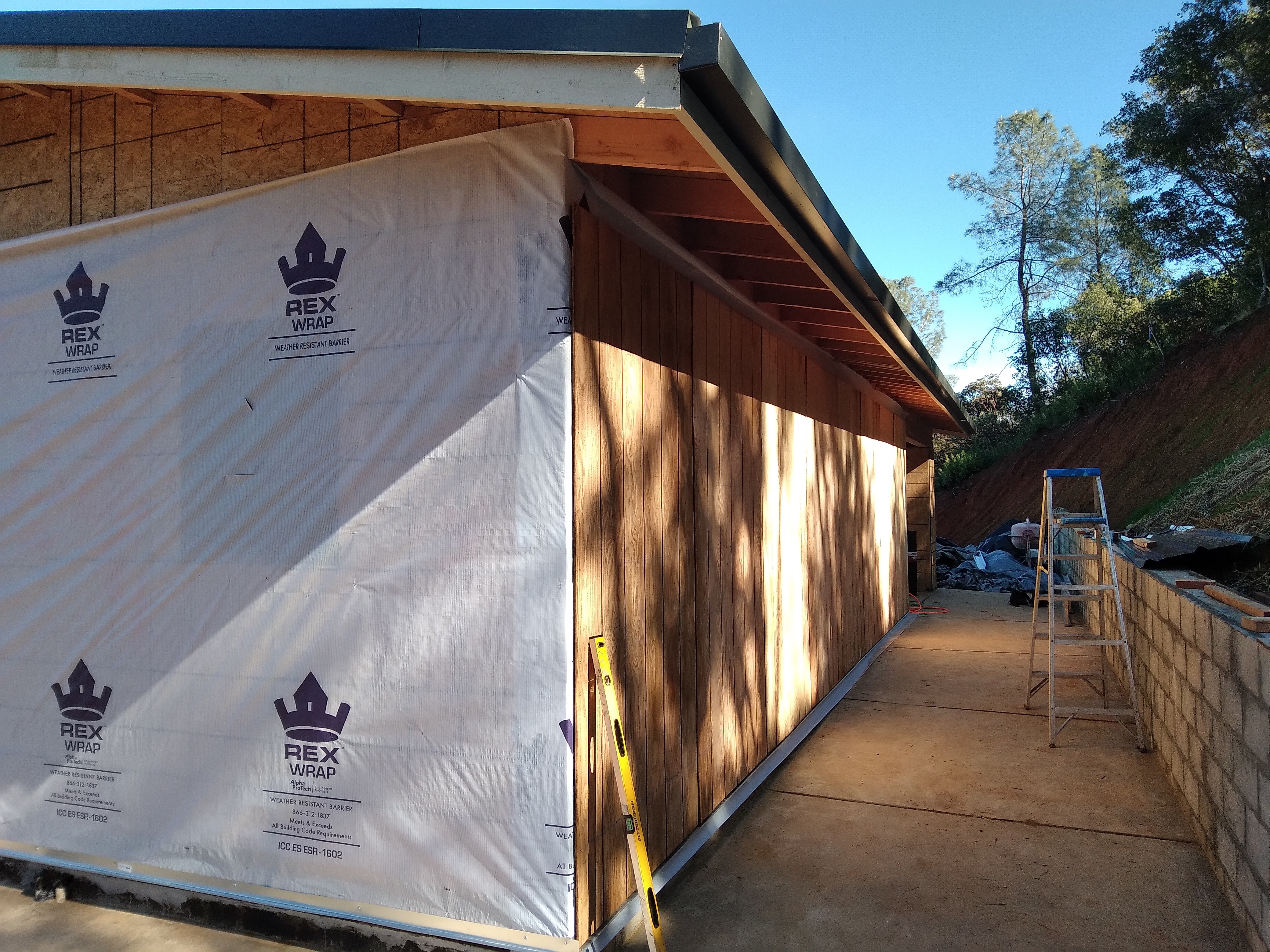 Home exterior siding and house wrap installation
