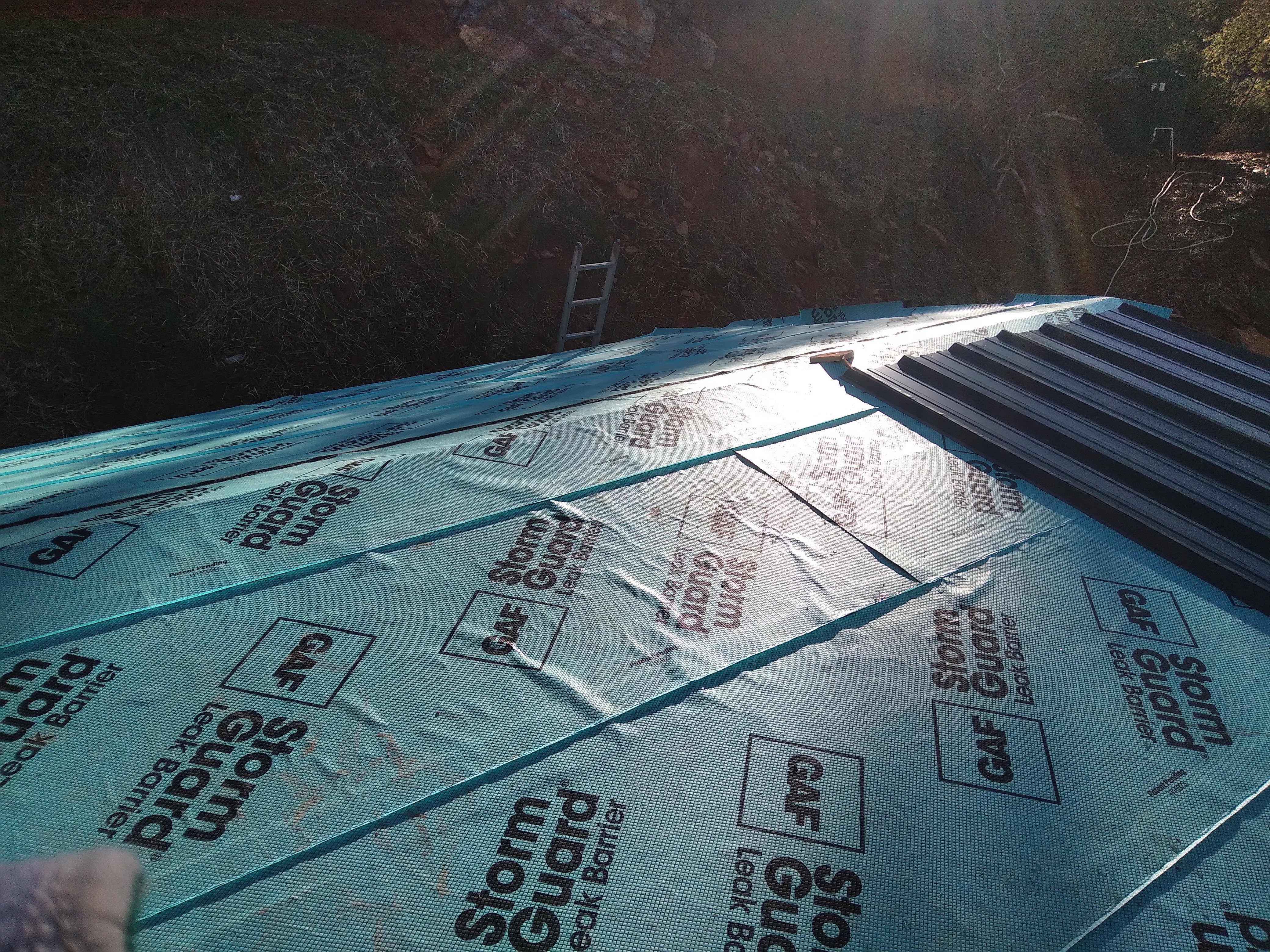 Metal roof underlayment prep and roof installation