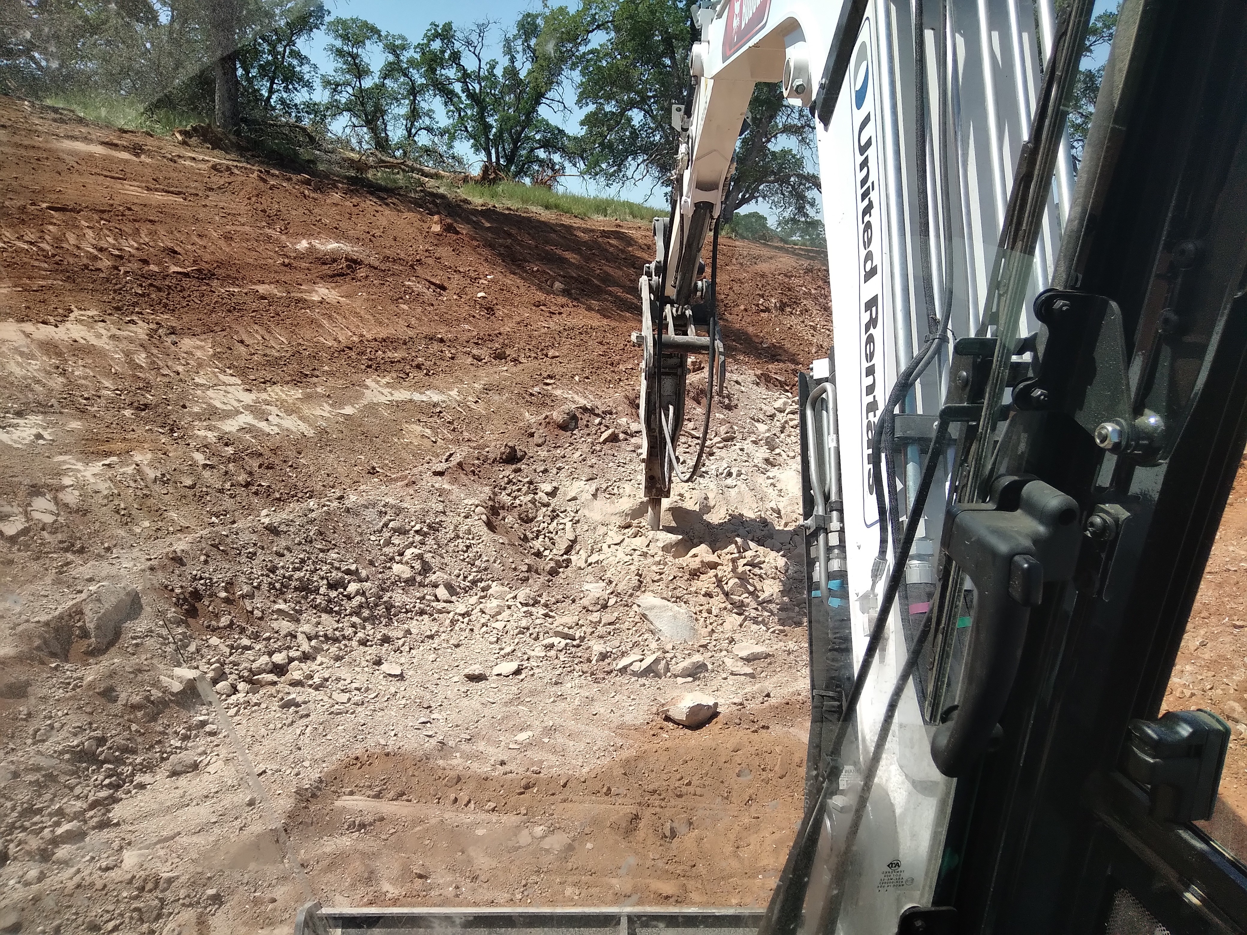Rock excavation and jackhammering bedrock in Mariposa CA